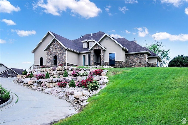 2675 Bybee Dr, Ogden, UT 84403 - craftsman house with stone siding, stucco siding, and a front lawn