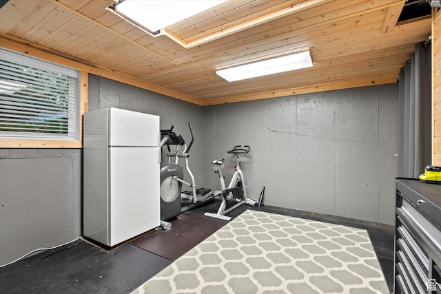 workout area with wooden ceiling