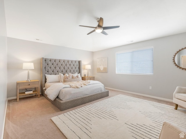 bedroom with carpet floors, baseboards, and ceiling fan