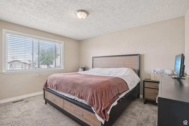 4372 S Wildrose Dr W, West Valley City, UT 84120 - carpeted bedroom featuring baseboards and a textured ceiling