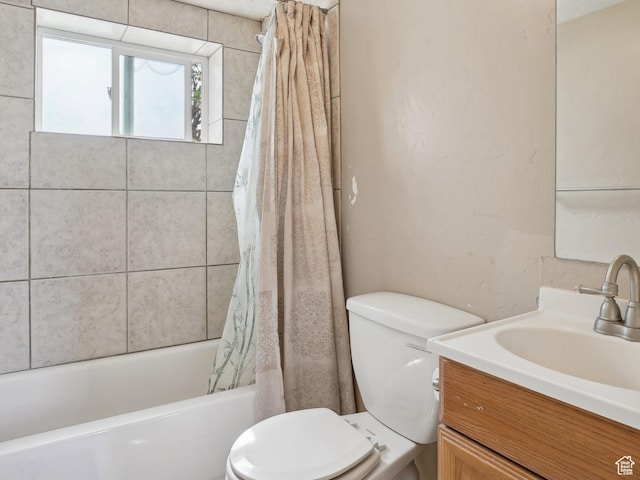 4372 S Wildrose Dr W, West Valley City, UT 84120 - bathroom with toilet, vanity, and shower / tub combo with curtain