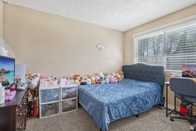 4372 S Wildrose Dr W, West Valley City, UT 84120 - bedroom with carpet flooring and a textured ceiling