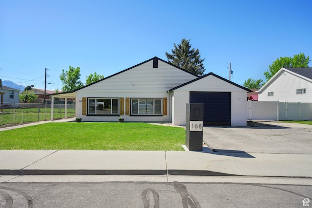single story home with asphalt driveway and a garage