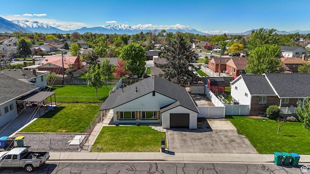 aerial view of residential area with a mountainous background