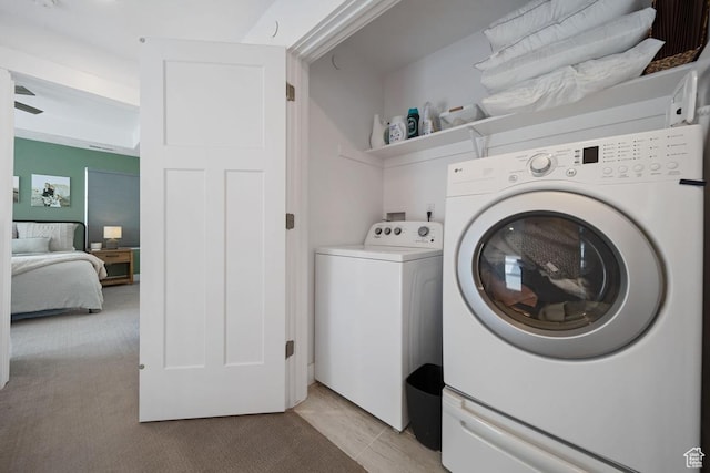 3850 W Kinglassie Ln, Taylorsville, UT 84129 - laundry room with washing machine and dryer