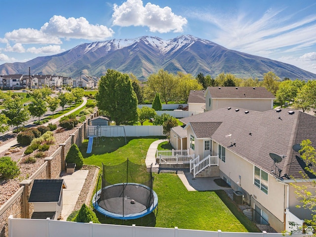 aerial view of residential area with a mountain backdrop