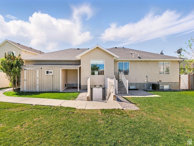 back of property featuring stucco siding, cooling unit, a patio area, and a shingled roof