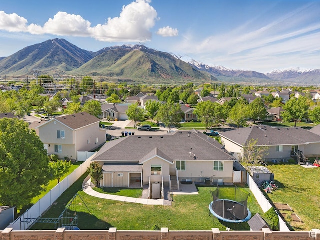 aerial view of residential area with a mountain backdrop