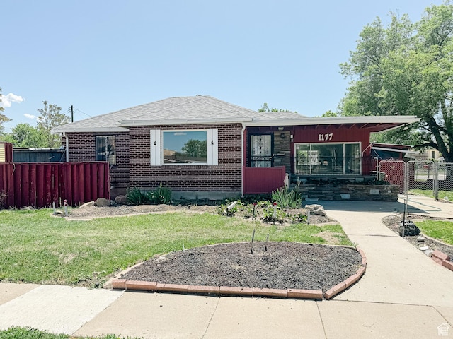 1177 W Picture Dr, Salt Lake City, UT 84116 - bungalow with brick siding and roof with shingles