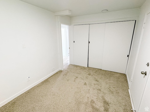 1177 W Picture Dr, Salt Lake City, UT 84116 - unfurnished bedroom with carpet flooring, a closet, and baseboards