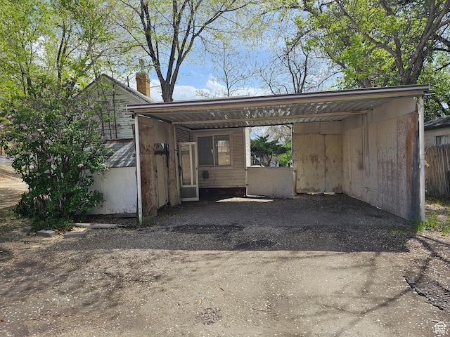 383 N 100 E, Price, UT 84501 - view of parking featuring driveway and fence