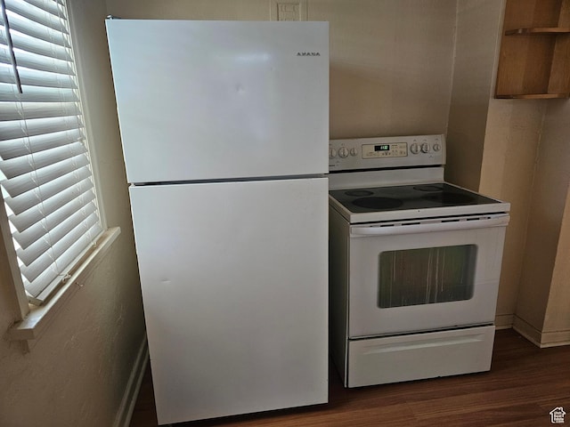 383 N 100 E, Price, UT 84501 - kitchen featuring white appliances and wood finished floors