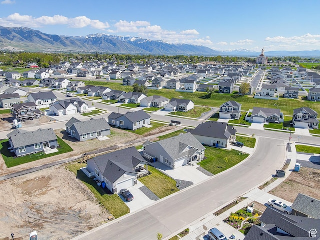 aerial view of residential area with mountains