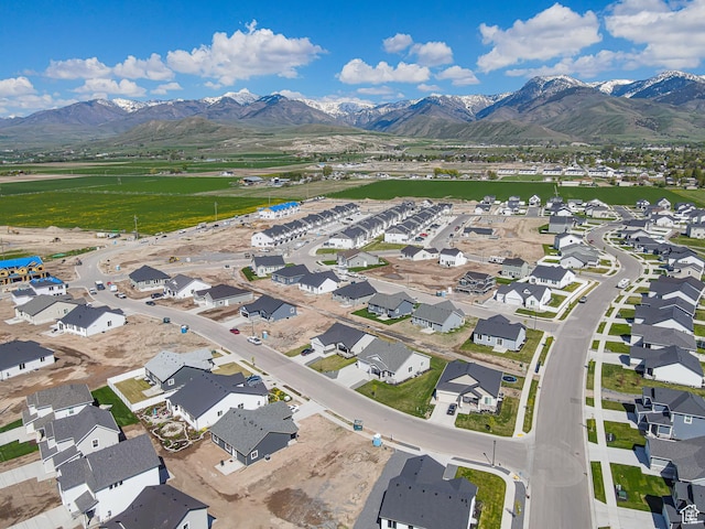 aerial perspective of suburban area with a mountainous background