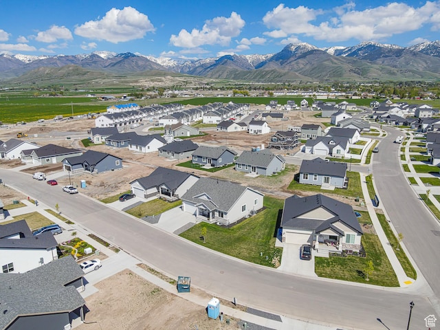 aerial perspective of suburban area featuring a mountainous background
