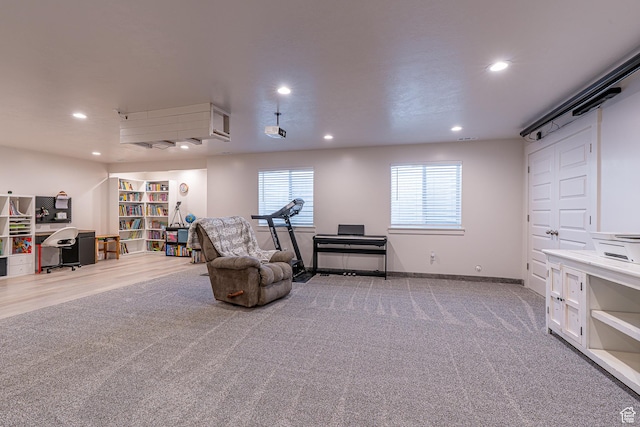 sitting room featuring recessed lighting, carpet flooring, and baseboards