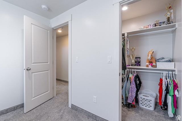 bedroom with carpet floors and recessed lighting