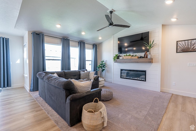 living room with a large fireplace, wood finished floors, ceiling fan, baseboards, and recessed lighting