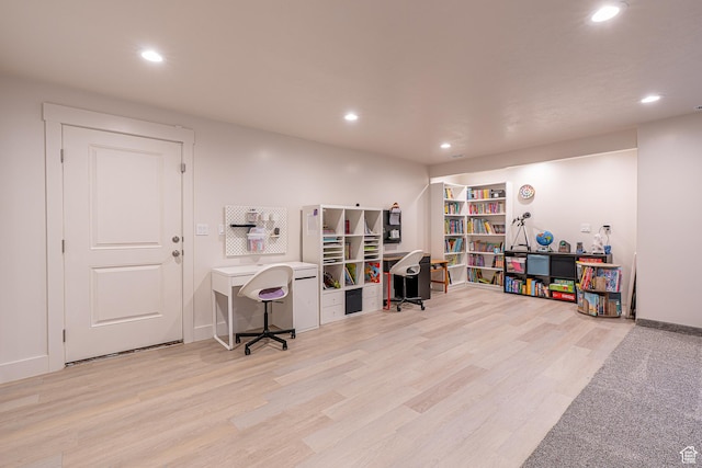 office featuring recessed lighting, wood finished floors, and baseboards