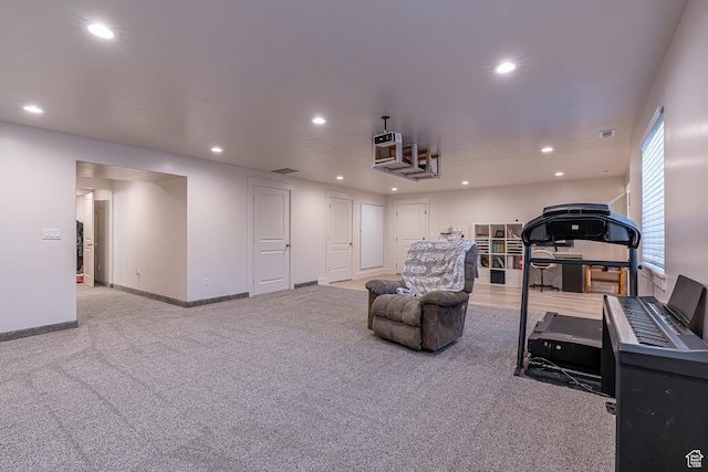 living area with carpet, recessed lighting, and baseboards