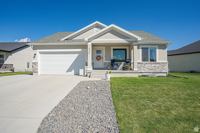 single story home featuring covered porch, stone siding, driveway, stucco siding, and a garage