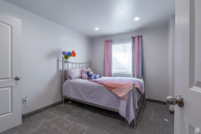 carpeted bedroom with recessed lighting and baseboards
