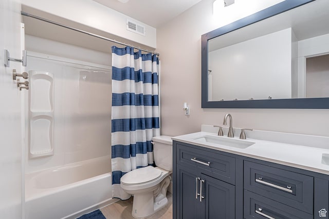 full bath with toilet, shower / tub combo, and vanity