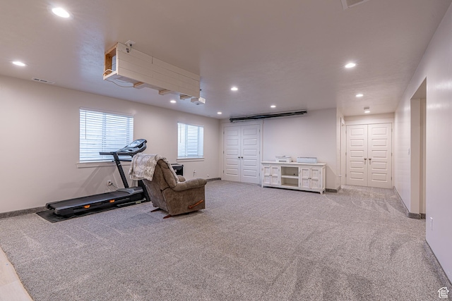sitting room featuring carpet, recessed lighting, and baseboards