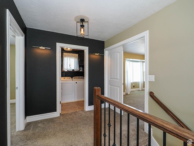 879 W Saddlebrook Dr, Kaysville, UT 84037 - corridor with an upstairs landing, independent washer and dryer, carpet flooring, a textured ceiling, and baseboards