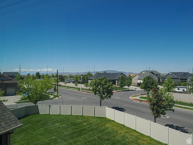879 W Saddlebrook Dr, Kaysville, UT 84037 - view of asphalt street featuring curbs, a residential view, and sidewalks