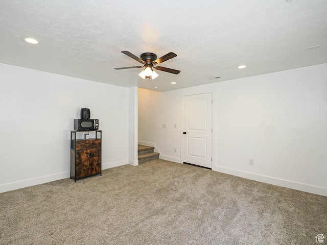 879 W Saddlebrook Dr, Kaysville, UT 84037 - unfurnished living room featuring recessed lighting, a ceiling fan, baseboards, carpet floors, and stairway