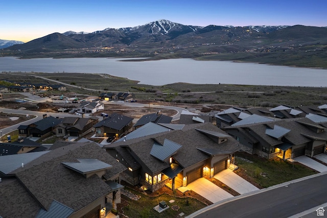 bird's eye view of a water and mountain view
