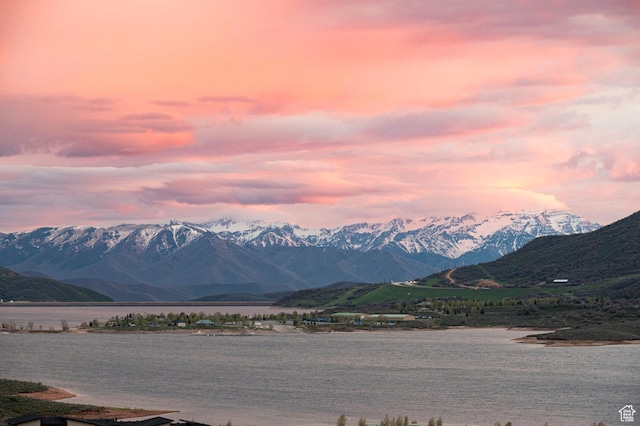 mountain view featuring a nearby body of water