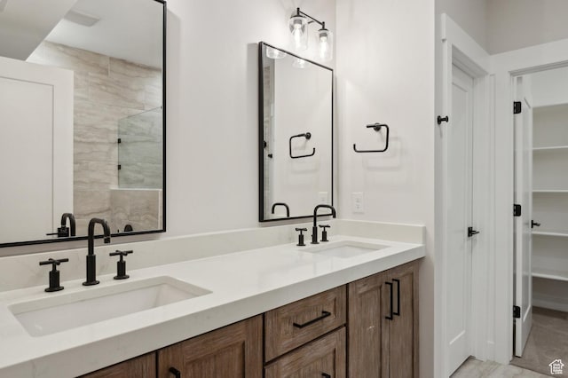 bathroom featuring double vanity