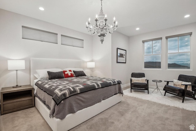 carpeted bedroom with a chandelier, baseboards, and recessed lighting
