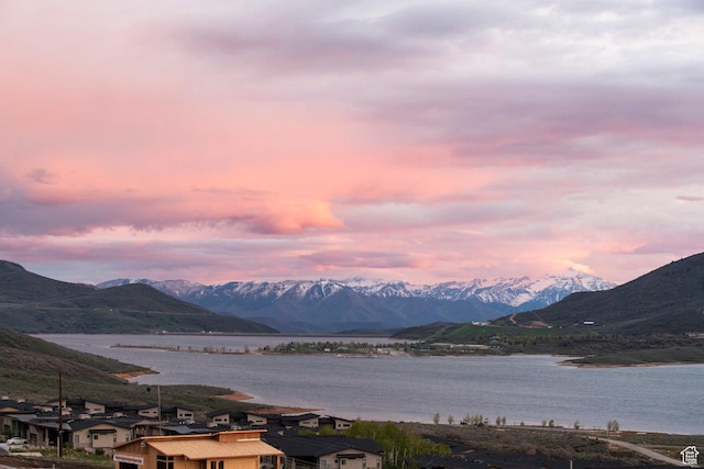 mountain view featuring a nearby body of water