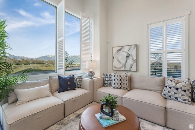 living area featuring a mountain view
