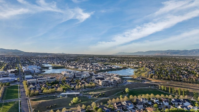 aerial view of residential area with a water and mountain view