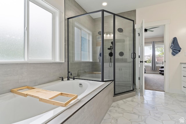2685 N 850 E, North Ogden, UT 84414 - bathroom with a stall shower, a bath, marble look tiles, and recessed lighting