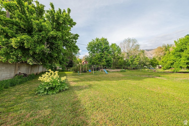 view of yard with a playground