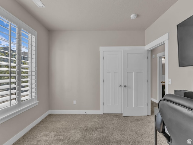 14642 S Mckellen Dr Unit 201, Herriman, UT 84096 - carpeted home office with plenty of natural light and baseboards