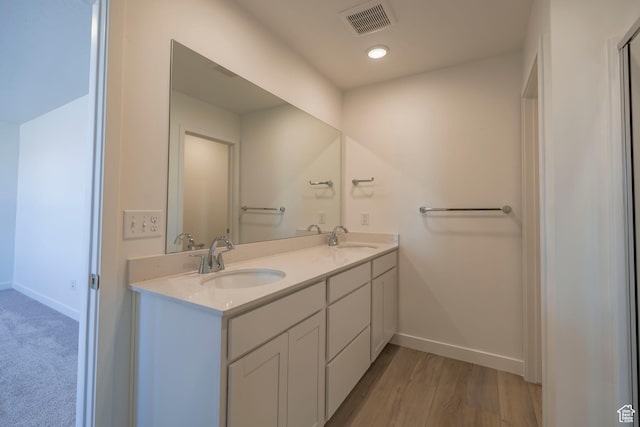 1579 N 800 W, Salem, UT 84653 - bathroom featuring baseboards, double vanity, and wood finished floors