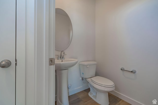 1579 N 800 W, Salem, UT 84653 - half bathroom with baseboards, toilet, and wood finished floors