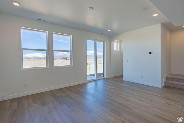 1579 N 800 W, Salem, UT 84653 - empty room with baseboards, wood finished floors, stairway, and recessed lighting