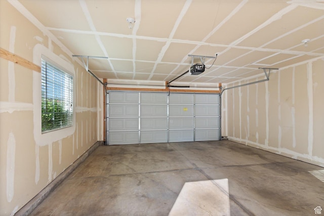 garage featuring a garage door opener