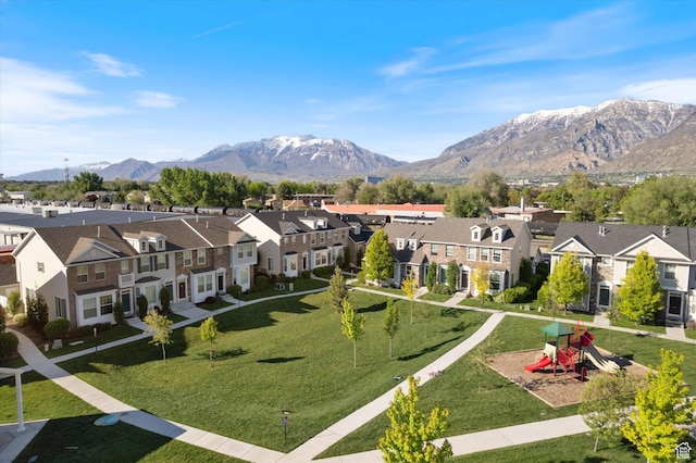 aerial perspective of suburban area featuring a mountainous background