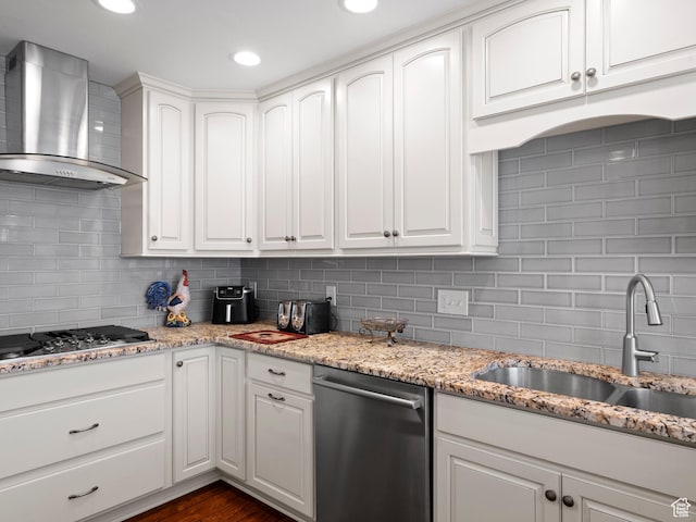 11834 S Cottage View Ln, Draper, UT 84020 - kitchen with wall chimney range hood, appliances with stainless steel finishes, a sink, backsplash, and white cabinetry