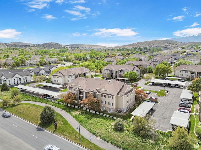 aerial perspective of suburban area featuring a mountain backdrop