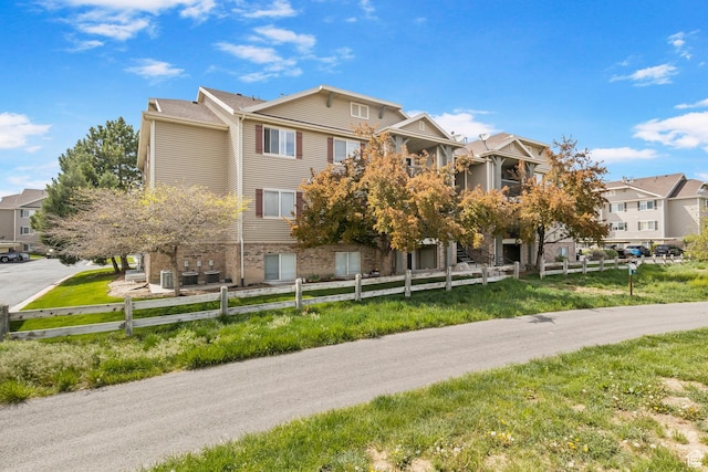 view of property with a residential view