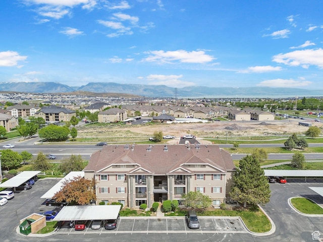 aerial view of residential area with a mountainous background